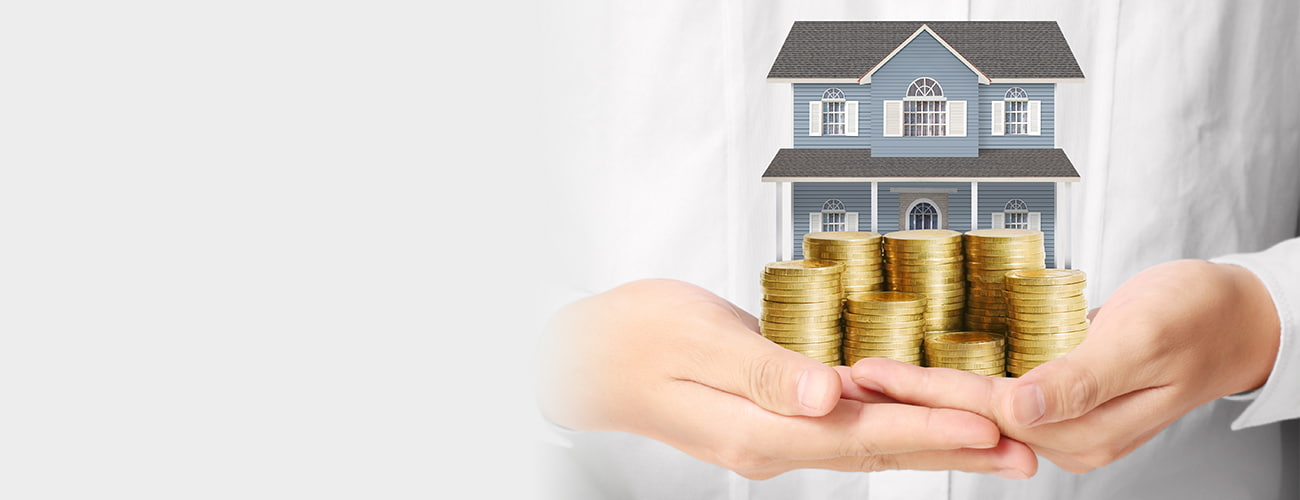Mortgage concept by money house from the coins