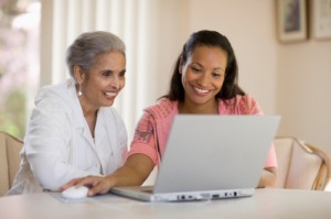 Daughter-and-mom-at-computer-300x199